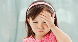 Como lidar com as dores de cabeça das crianças