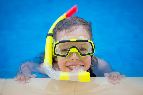 O mergulho para crianças é um esporte recomendado.