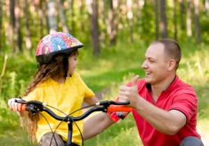 Como ensinar as crianças a andar de bicicleta